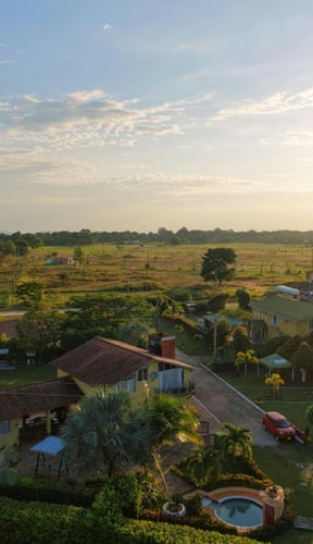 Aerial view of coastal neighborhood at sunset